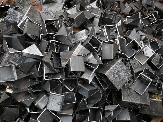 background of a pile of cut metal pieces